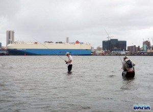 Simon  and Christian releasing fish